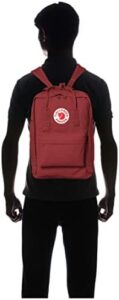 Stay organized and stylish with the Fjällräven Unisex Adults' Kånken Laptop Backpack, featuring durable 1000D nylon fabric and comfortable shoulder straps. Perfect for daily use or travel, ideal for laptops up to 13 inches.