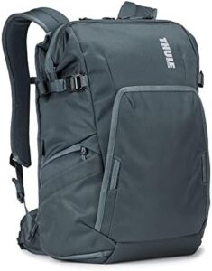 Protect your gear with Thule's Covert Camera Backpack, featuring rugged 600D polyester construction and comfortable carry straps. Ideal for travel or adventure.