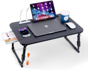 Here is the output:

Elevate your workspace with our laptop desk, adjustable to bed height. Foldable design for portability and storage drawer for convenience. Perfect for sofa, couch, floor or bed use.