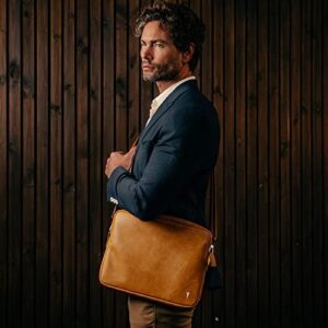 Protect your laptop in style with the TORRO genuine leather messenger bag, compatible with 13-14" laptops or MacBooks. Durable and water-resistant design.