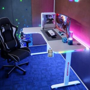 Elevate your gaming experience with the MIUZ RGB LED Gaming Desk featuring a carbon fiber design, cup holder, and headphone hook. Perfect for home office use, this 160cm desk offers ample space to work and play.