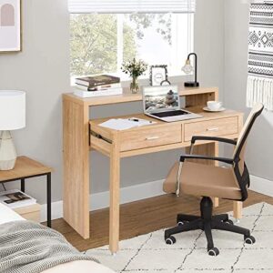 "Transform your home office with the Giantex 100 CM Computer Desk, featuring a modern design, extendable desktop, and ample storage. Perfect for small spaces, this study desk offers a wood-colored finish and wheelbase for easy mobility."