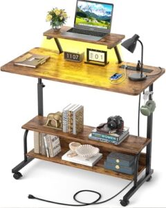 Elevate your workspace with the Height Adjustable Standing Desk featuring power outlets, LED lights and storage shelves for ultimate comfort and organization. Perfect for laptops and monitors.