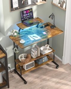 Elevate your workspace with the Height Adjustable Standing Desk featuring power outlets, LED lights and storage shelves for ultimate comfort and organization. Perfect for laptops and monitors.