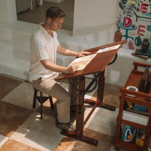 Perfect desk for artists! Elevate your creative space with the MEEDEN Adjustable Art Drafting Table, featuring a solid beech wood construction, tilting tabletop and ample workspace.
