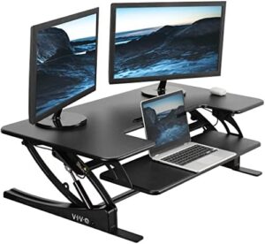 Elevate your workspace with the VIVO Black Extra Wide Height Adjustable Stand Up Desk Converter. Perfect for dual monitors, adjustable height and quick sit-to-stand transition.