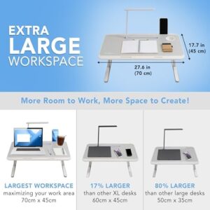 Here is the optimized meta description:

"Transform your workspace with the UltraFlex Premium Lap Desk, featuring a spacious X-Large workspace, adjustable height and tilt, storage drawer, reading light, and foldable design. Perfect for bed, couch or floor use."