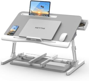 Elevate your workspace comfort with this portable Bed Desk for Laptop, featuring adjustable legs, storage drawer, and tablet slot. Perfect for working, writing, reading or eating in style.