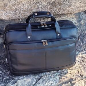 Protect your 17.3" laptop in style with the Star Vista Matteo Large Messenger Bag, crafted from premium calfskin leather and featuring YKK zippers and brass hardware.