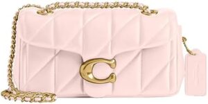 Discover the Coach Tabby Shoulder Bag, a stylish and spacious accessory featuring multiple pockets and compartments. Perfect for daily use or travel.