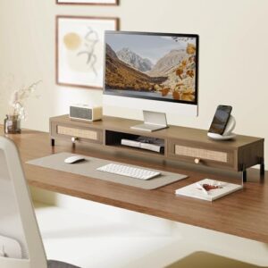 Here is the generated meta description:

"Boost your workspace with Fenge's Dual Monitor Stand featuring a wooden riser and rattan woven drawer. Perfect for 2 monitors, laptops, printers, or TVs. Compact design for clutter-free desks."